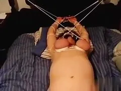 Fastened and teats tortured