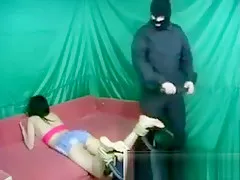 Asian girl feet whipped by big master