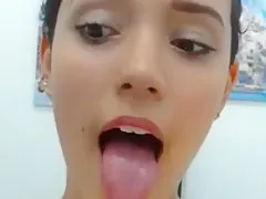Beautiful Latina teen 18+ opens mouth, crosses eyes, and shows sexy feet
