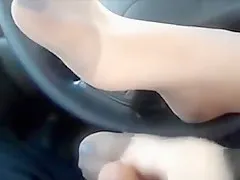 Teasing Her Feet In Pantyhose In A Car
