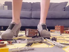 teen 18+ : Heels Crushing a Nerd Train Set
