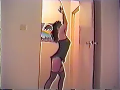 Vintage bondage girl tied hands over head