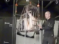 Amateur slavegirl in a cage