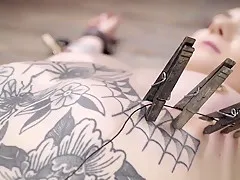 Alt blonde in extreme device bondage