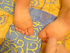 stepson jerks on his Step mother's feet while she and cums on her heels