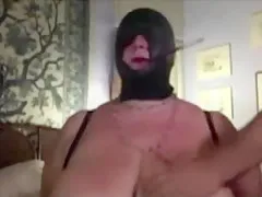 Augusta- Slut wife hooded and smoking with long holder
