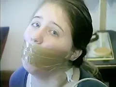 Girl Mouth Stuffed and Wrap Gagged