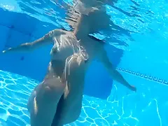 Hot sexy body in a cool Ibiza pool with a guy, relax music