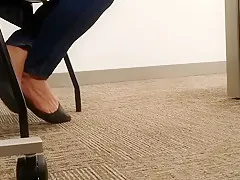 A Look At An Office Managers Well Worn Black Ballet Flats