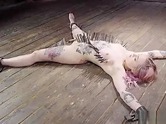 Chained alt blonde standing in bondage