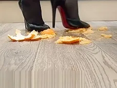 Girl in high-heeled shoes crushes fruit (crush fetish by vidicats)