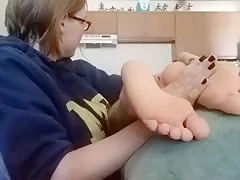 Giving Babe a foot massage after work