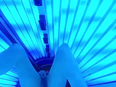 Hot wife masturbates in public tanning bed