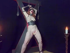 Submissive Redhead Milf Tied To Cross And Tortured With Clothespins