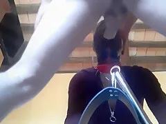 Tied To A Machine, Masked, Hooded And