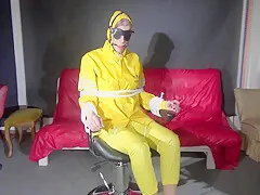 Sexy Pia Being Tied And Gagged On A Chair Wearing Sexy Shiny Nylon Rainwear (Video)