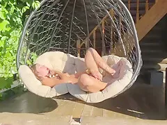 Blonde Fucks Her Didlo With A Big Rubber Dick On A Swing