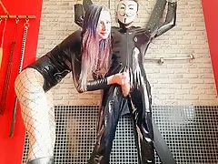 A Slave On A St. Andrews Cross And The Dominatrix Nika Milks His Dick. Slave