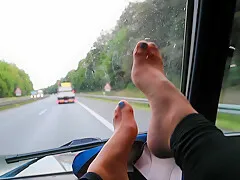 Sweaty Nylon Feet Playing On The Windshield